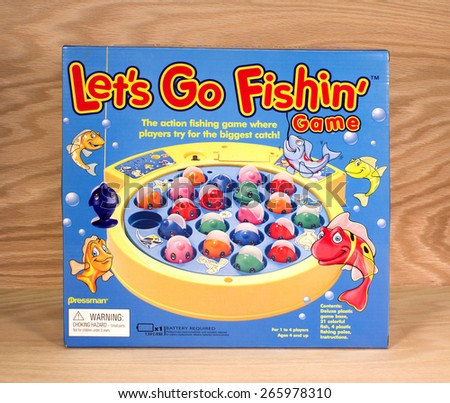 RIVER FALLS,WISCONSIN-APRIL 1,2015: A Lets Go Fishing game box by Pressman Toy Corporation. Pressman Toys was bought by Goliath Games in Twenty Fourteen.