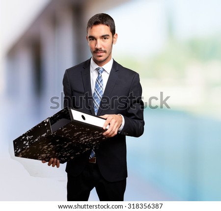 Young businessman saving files