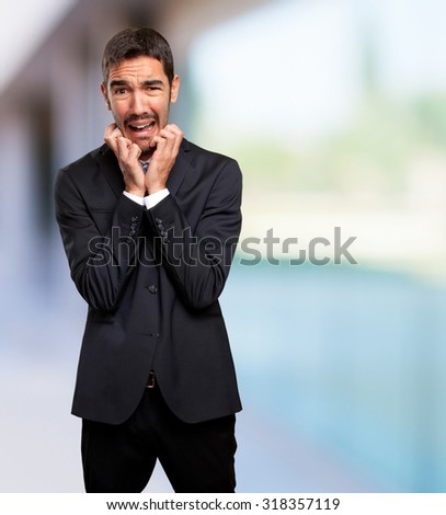 Young businessman crying