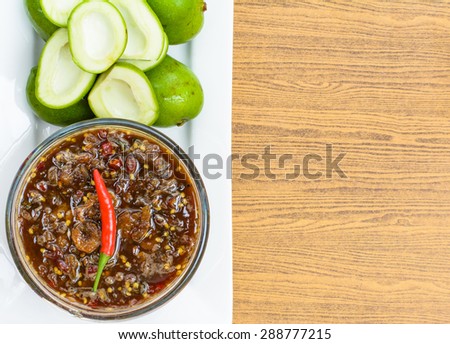 Sour taste with green of fresh mangoes and sweet fish sauce and spicy of Thai snack