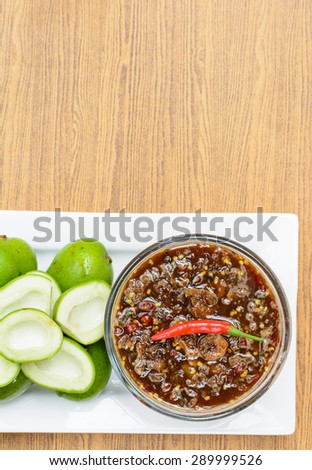 Sour taste with green of fresh mangoes and sweet fish sauce and spicy of Thai snack