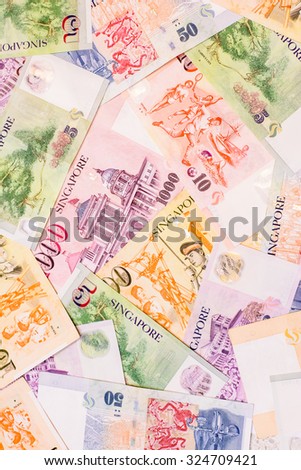 Ready for exchange with colorful of Singapore dollars currency,money