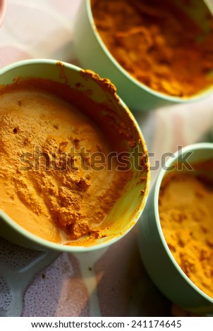 This is a turmeric. It is an herb. In thailand we use it to scrub.Turmeric powder is used extensively in South Asian cuisine.Some time use for ceremony to monk.