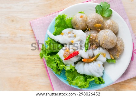 Thai Traditional Dessert, Tapioca balls with pork filling serve with vegetable, Steamed Rice Skin Dumplings Made From Glutinous Rice Filled with Minced Pork and Sweet Pickled Daikon Radish.