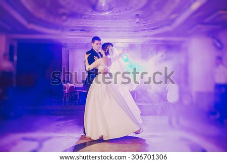 romantic couple dancing on their wedding