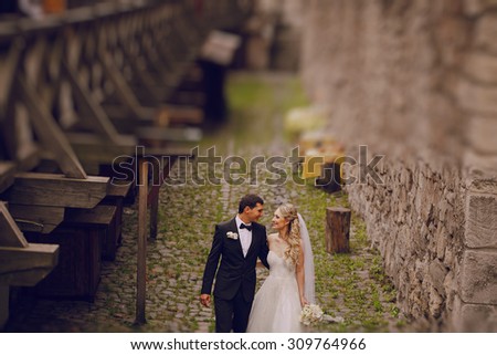 lovely wedding couple walking on their wedding day