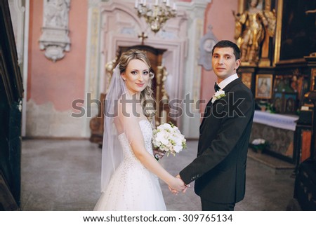 Wedding couple in church Christians take wedding