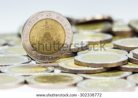 Coins of Thailand. Wat Arun Temple in Bangkok, Thailand, depicted in the Thai ten baht coin.