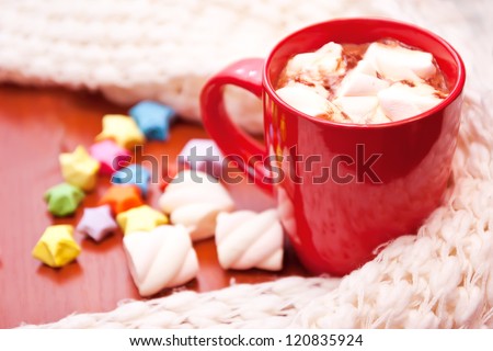 A cup of cacao with marshmallow