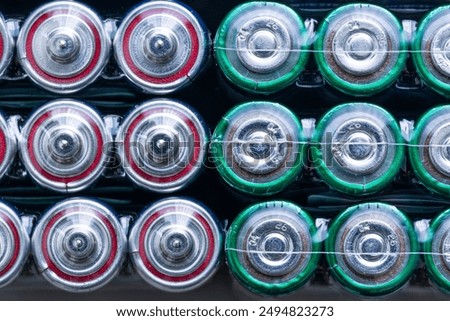 Similar – Image, Stock Photo Several new alkaline batteries in one size in rows