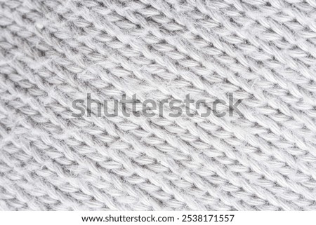 Similar – Image, Stock Photo Brown crumpled knitted scarf or sweater texture, top view. Texture background of warm crocheted clothing textile. Knitwear fabric.