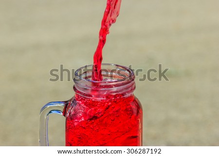 Pour water into a glass