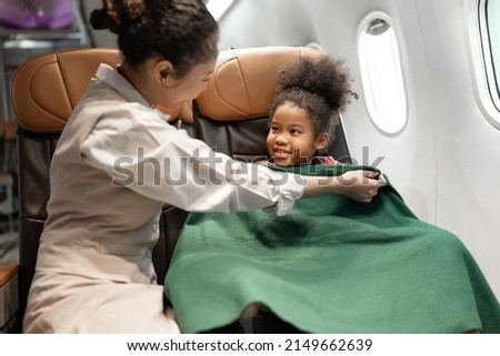 Similar – Image, Stock Photo Female traveler with blanket standing on lake shore against mountains