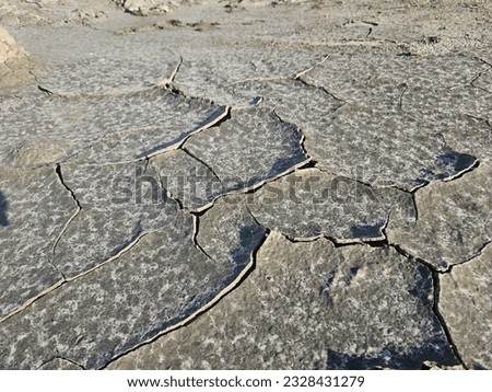 Similar – Image, Stock Photo Nice cracked mud dryness