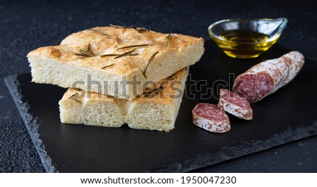 Similar – Foto Bild Hausgemachtes Rosmarin-Focaccia-Brot, Ansicht von oben, Nahaufnahme.