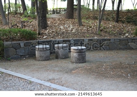 Stone chairs in a forest park ストックフォト © 