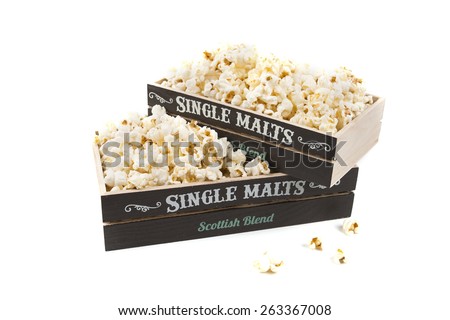 A wide classic box of theater popcorn isolated on white