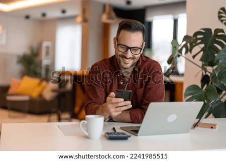 Similar – Image, Stock Photo Smiling entrepreneur using smartphone outside office building