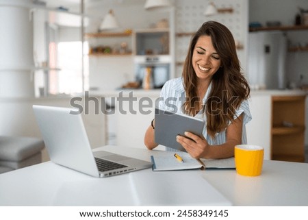 Similar – Image, Stock Photo Woman with tablet in stylish suit lying in grass