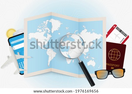 Travel destination Syria, tourism mockup with travel equipment and world map with magnifying glass on a Syria. Trip template.