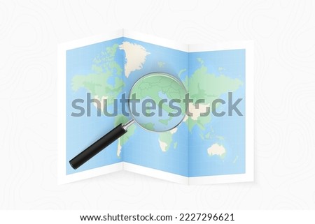 Enlarge Vatican City with a magnifying glass on a folded map of the world. Vector paper map.