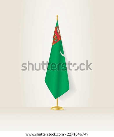 Turkmenistan flag on a flag stand. Vector illustration.