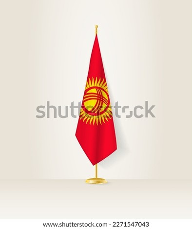 Kyrgyzstan flag on a flag stand. Vector illustration.