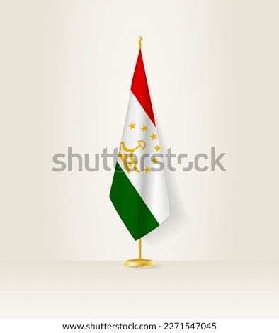 Tajikistan flag on a flag stand. Vector illustration.