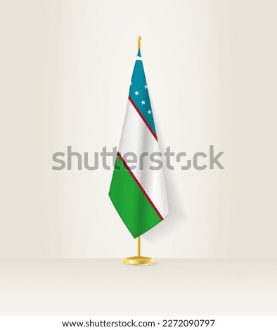 Uzbekistan flag on a flag stand. Vector illustration.