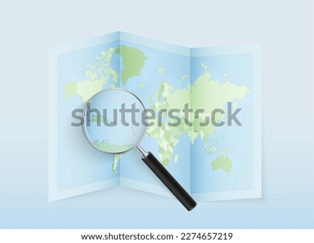 A folded world map with a magnifying lens pointing towards Puerto Rico. Map and flag of Italy in loupe. Vector illustration in blue color tone.