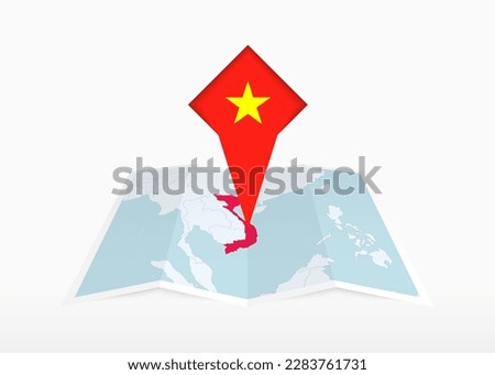 Vietnam is depicted on a folded paper map and pinned location marker with flag of Vietnam. Folded vector map.