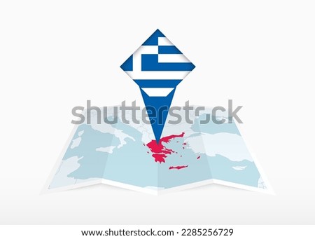 Greece is depicted on a folded paper map and pinned location marker with flag of Greece. Folded vector map.