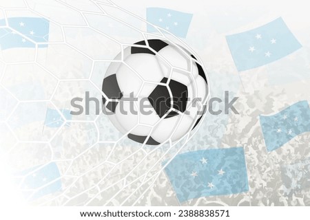 National Football team of Micronesia scored goal. Ball in goal net, while football supporters are waving the Micronesia flag in the background. Vector illustration.