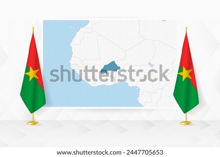 Map of Burkina Faso and flags of Burkina Faso on flag stand. Vector illustration for diplomacy meeting.