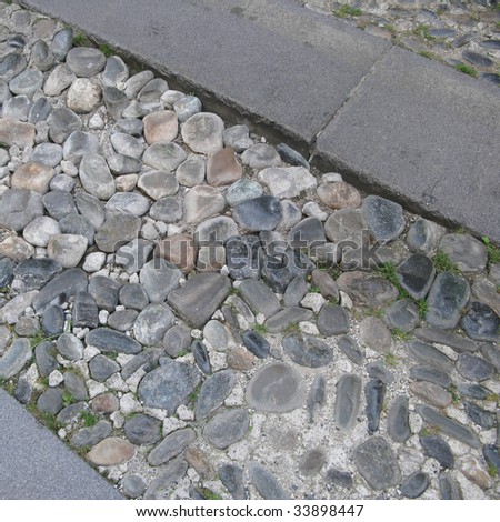 Stone paving floor of a street sidewalk
