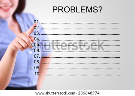 business woman pointing problem list