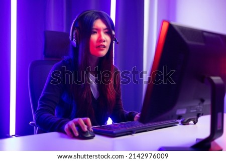 Similar – Image, Stock Photo Unhappy girl playing video game in evening time