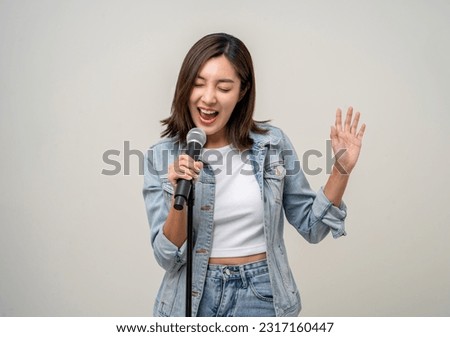 Similar – Image, Stock Photo Woman singing with microphone