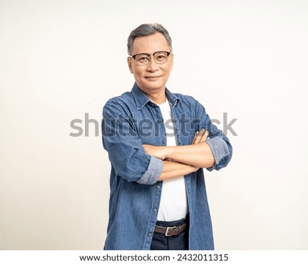 Similar – Image, Stock Photo Asian man standing on street