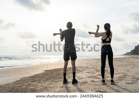 Similar – Foto Bild Schlanke Frau dehnt sich beim Training an der Strandpromenade