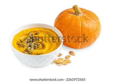 Similar – Image, Stock Photo Pumpkin creamy soup served on green leaf