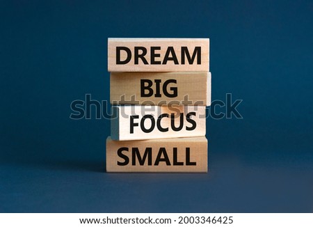 Similar – Image, Stock Photo Small wooden blocks with character icons and a gear shape around them