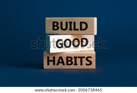 Build good habits symbol. Wooden blocks with words 'build good habits'. Beautiful grey background, copy space. Business, psychological and build good habits concept. Photo stock © 