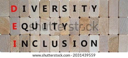 DEI, Diversity, equity, inclusion symbol. Wooden blocks with words DEI, diversity, equity, inclusion on beautiful wooden background. Business, DEI, diversity, equity, inclusion concept.