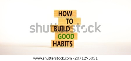 Build good habits symbol. Wooden blocks on beautiful white background, copy space. Words 'How to build good habits'. Build good habits concept. Copy space.