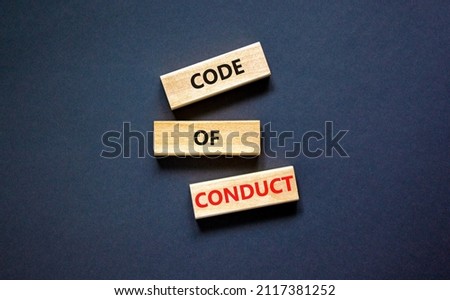 Code of conduct symbol. Concept words Code of conduct on wooden blocks on a beautiful black table black background. Business and code of conduct concept. Copy space. Сток-фото © 