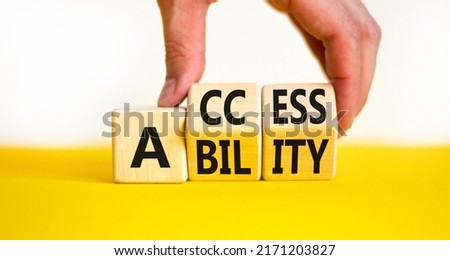 Access and ability symbol. Concept words Access and Ability on wooden cubes. Businessman hand. Beautiful yellow table white background. Access ability and business concept. Copy space. Stockfoto © 
