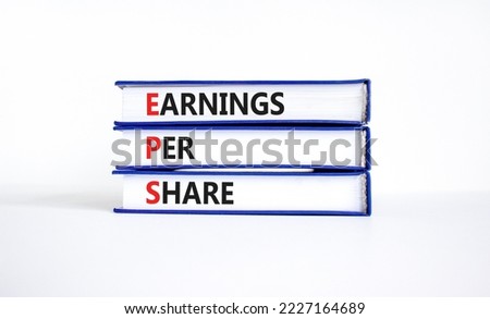 EPS earnings per share symbol. Concept words EPS earnings per share on books on a beautiful white background. Business and EPS earnings per share concept. Copy space. Zdjęcia stock © 