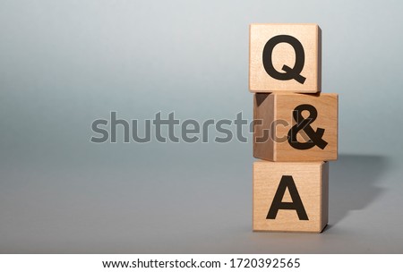 Q&A - acronym from wooden blocks with letters, questions and answers Q&A concept on grey background. Copy space available Stock foto © 