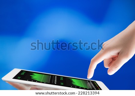 hand hold and tap digital tablet